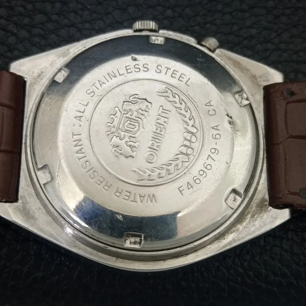 Vintage 1979 Orient Automatic Mens Silver Watch W/daydate & Gold accents